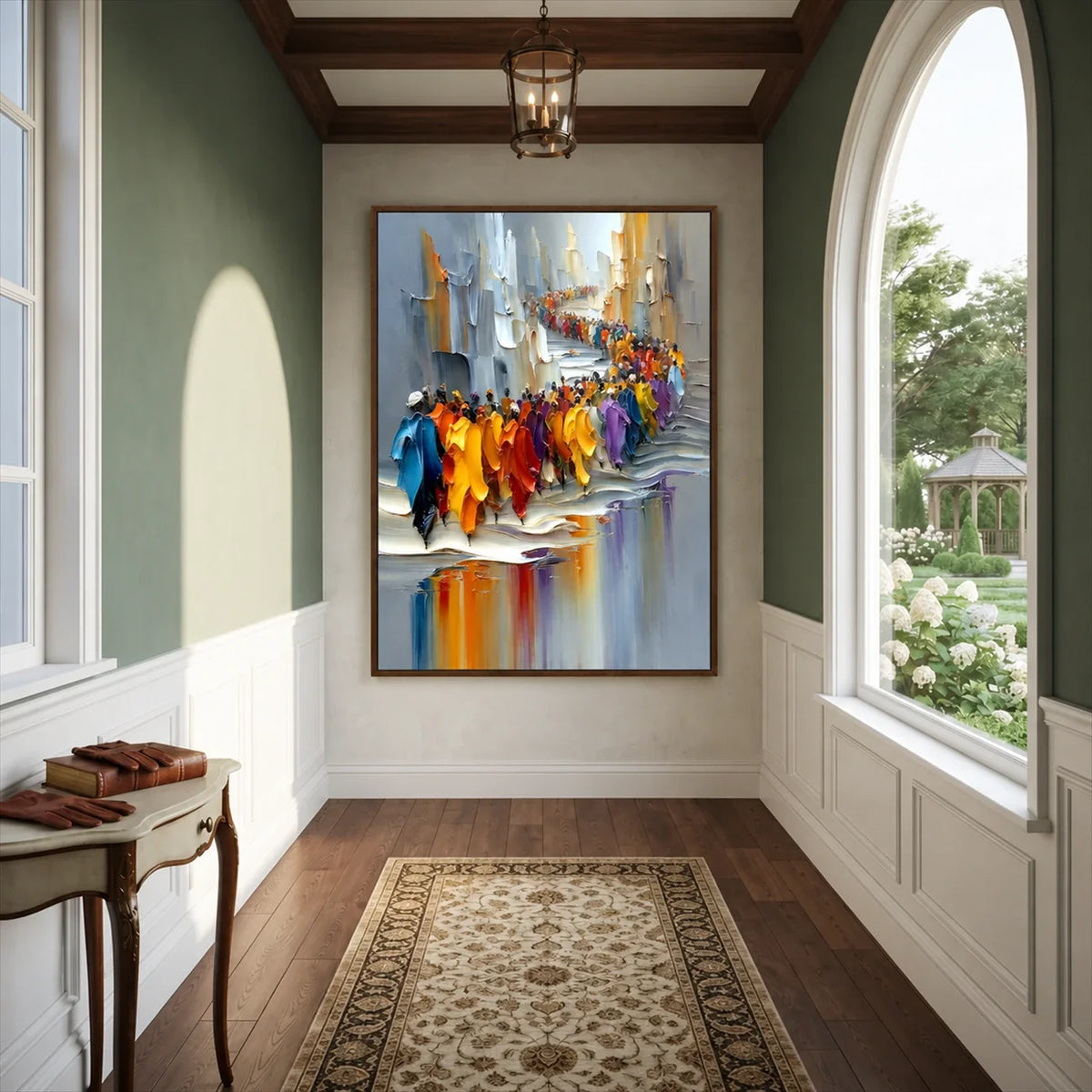 Framed city parade wall art in a hallway with green walls, an arched window and a patterned rug.