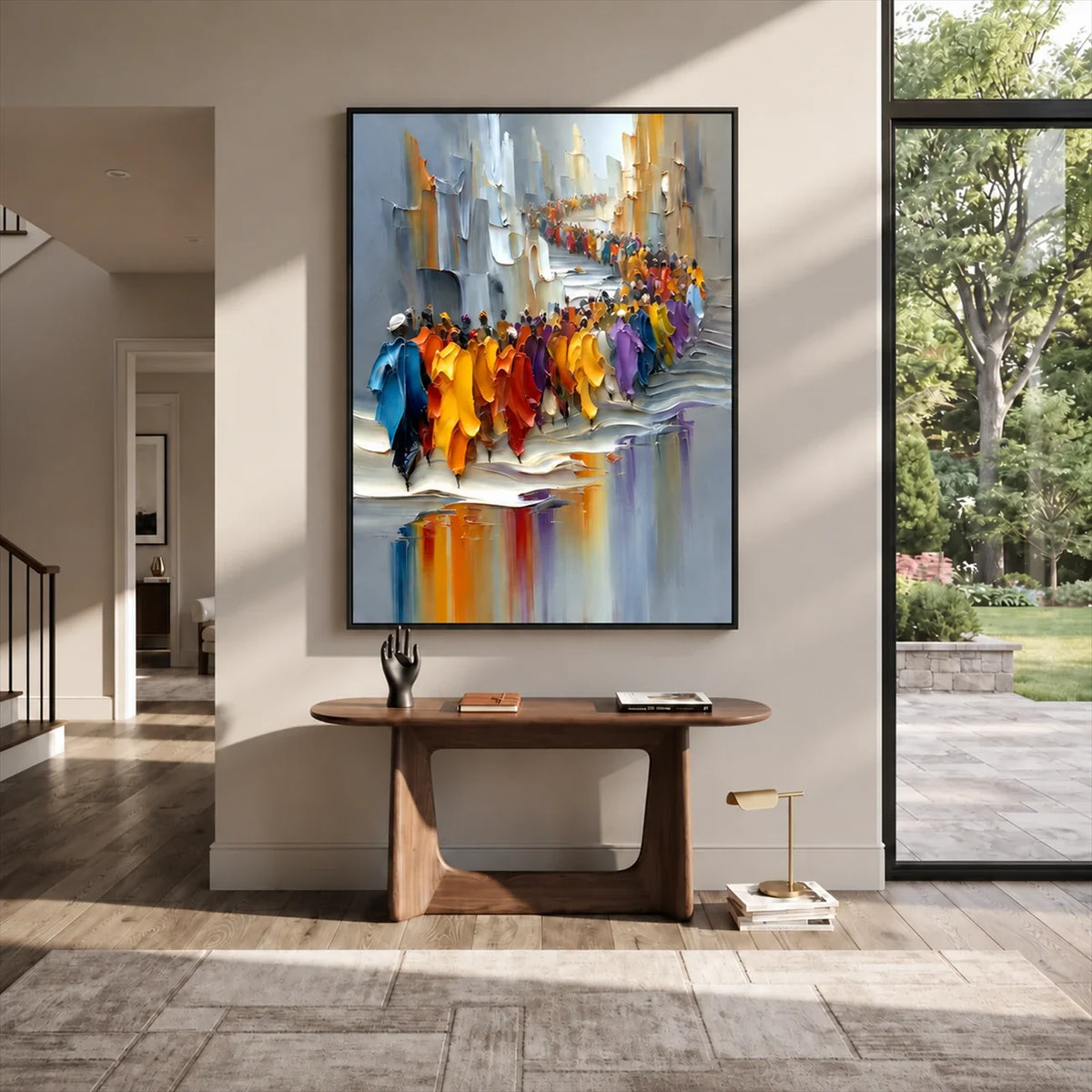 City parade wall art in a dark frame above a wooden console in a bright modern entryway.