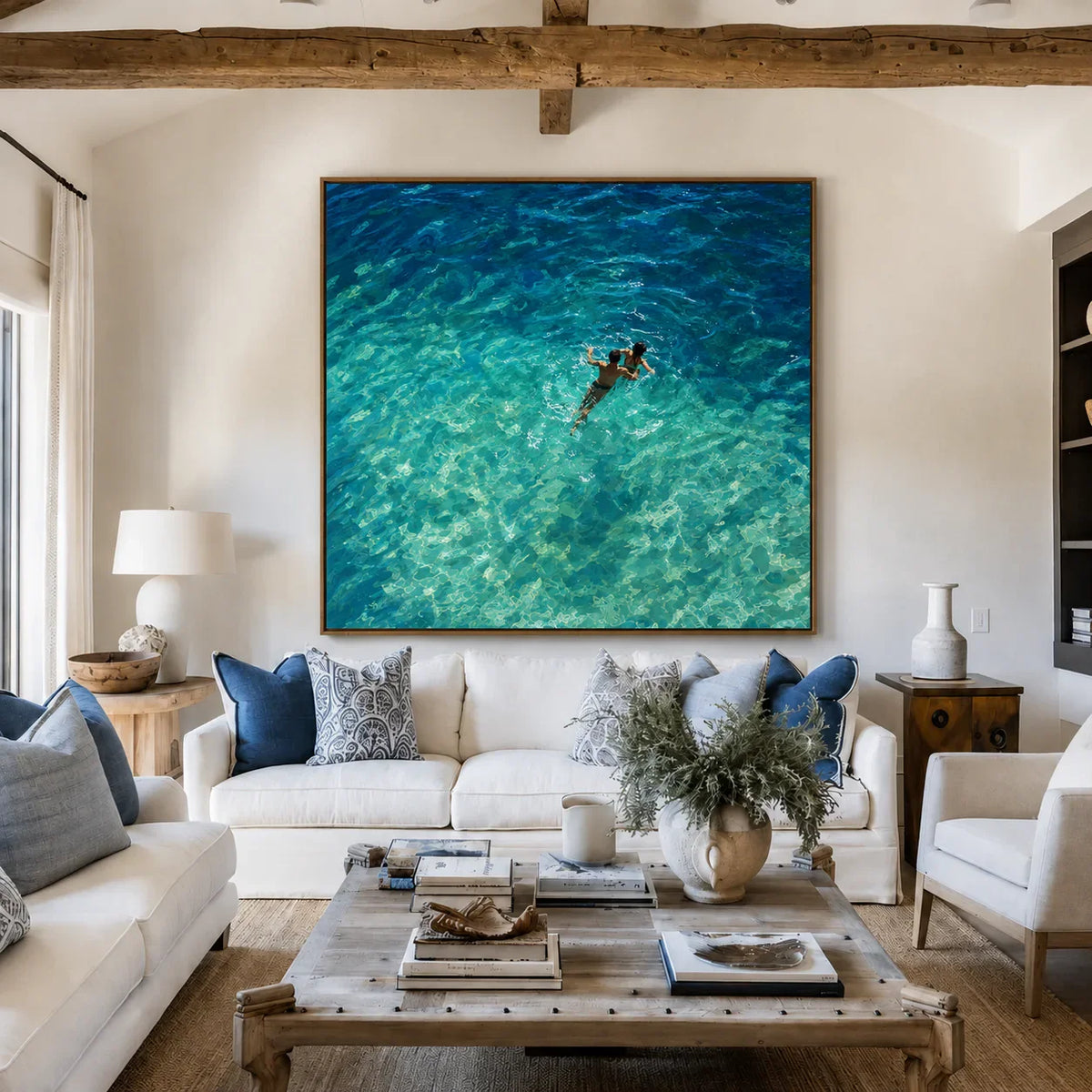 Two Swimmers in Sunlit Turquoise Water Wall Art styled interior scene 4 | Olyrel