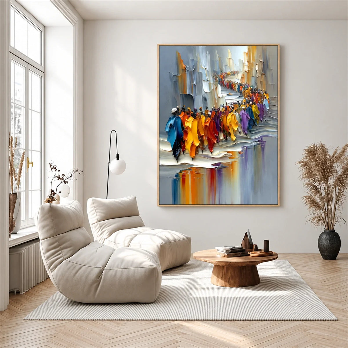 City parade wall art above a cream floor chair in a bright living room with a low wooden coffee table.