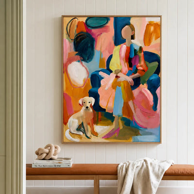 Colorful Seated Figure with a Golden Dog Wall Art styled interior scene 2 | Olyrel