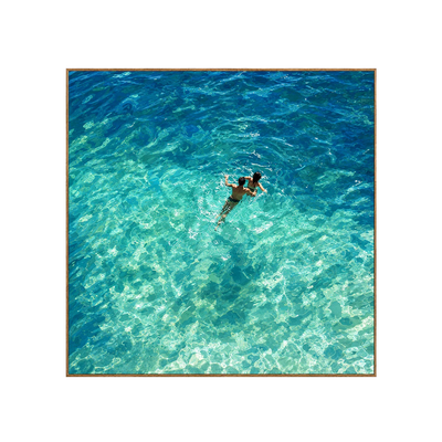 Two Swimmers in Sunlit Turquoise Water Wall Art | Olyrel