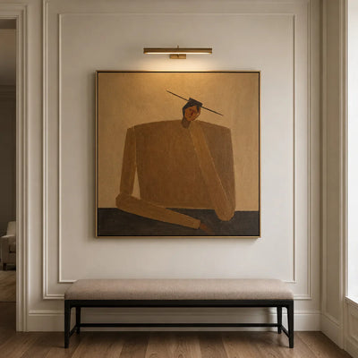 Ochre Seated Figure in Quiet Balance Wall Art styled interior scene 1 | Olyrel