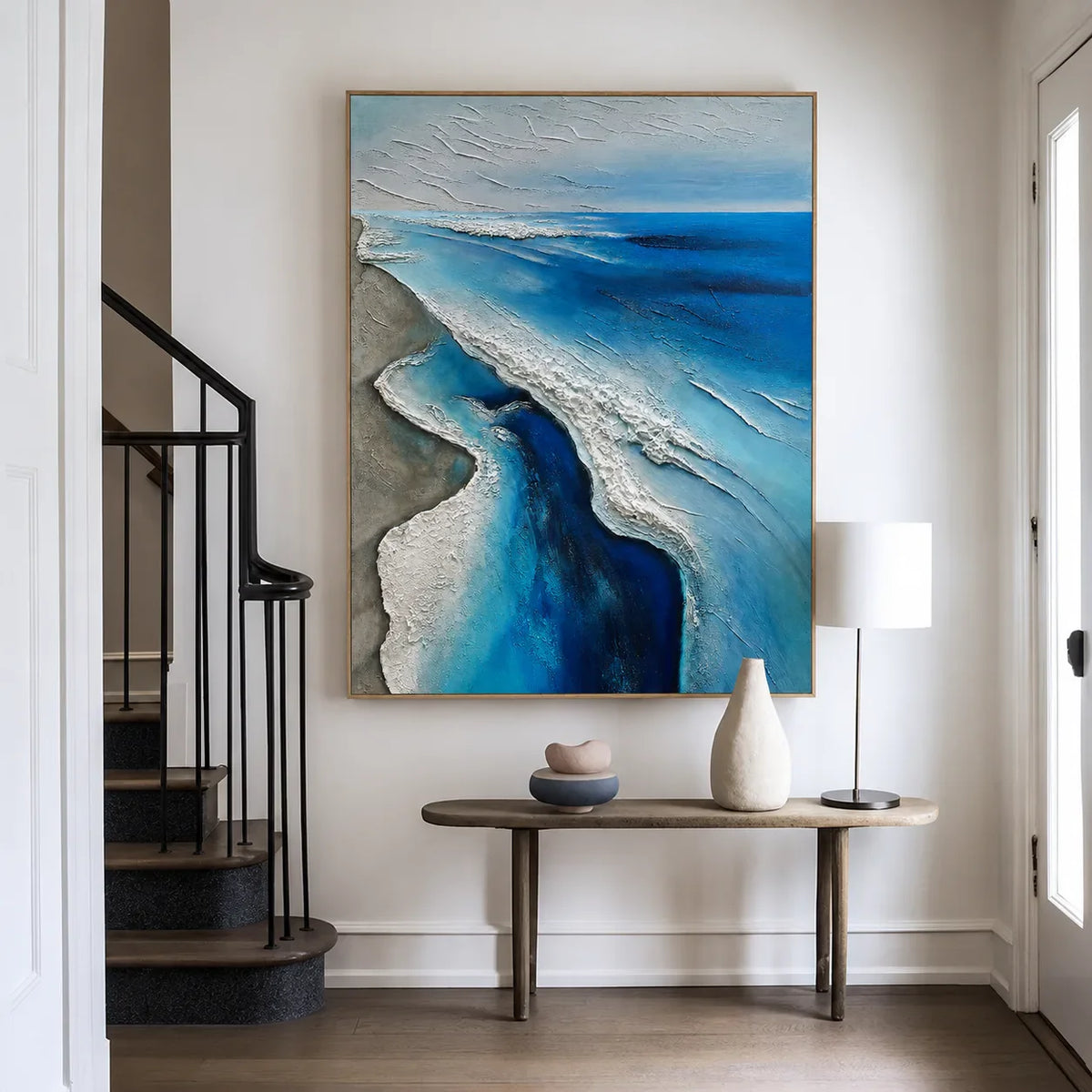 Winding Blue Surf Along a Silver-Gray Shore Wall Art styled interior scene 2 | Olyrel