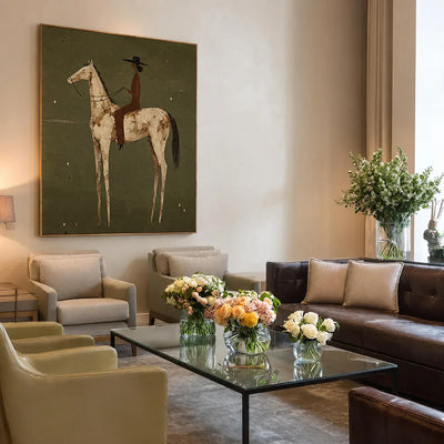 Dark-Hatted Rider on a Cream Dappled Horse Wall Art styled interior scene 1 | Olyrel
