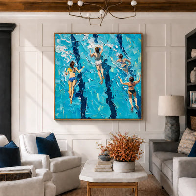 Four Swimmers in Brilliant Turquoise Water Wall Art styled interior scene 2 | Olyrel